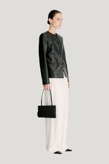 ADEA Collarless leather jacket — model side