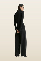 Compact knit buttoned top — model back