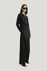 Compact knit buttoned top — model front