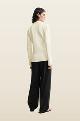 Compact knit buttoned top — model back