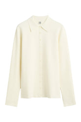 Compact knit buttoned top — packshot