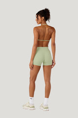 Form Invisible Scrunch Shorts | Soft Matcha — model side
