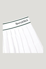 Serif Logo Pleated Skirt - White/Forest — model side