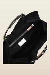 Sienna In Black Suede — model back