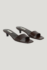 Slim lizard-embossed bandeau mules — model front