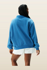 Varsity Mockneck - Washed Indigo + Peel — model back