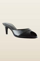 Cave Mule in Black Creased Leather — model back