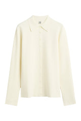 Compact knit buttoned top — packshot