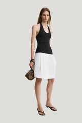 Compact knit halter top — model front