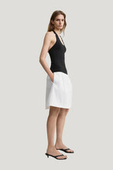 Compact knit halter top — model side