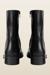 Daryl Ankle Boot in Black Leather — model back