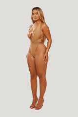 The Fishtail Swimsuit in Bronze — model side