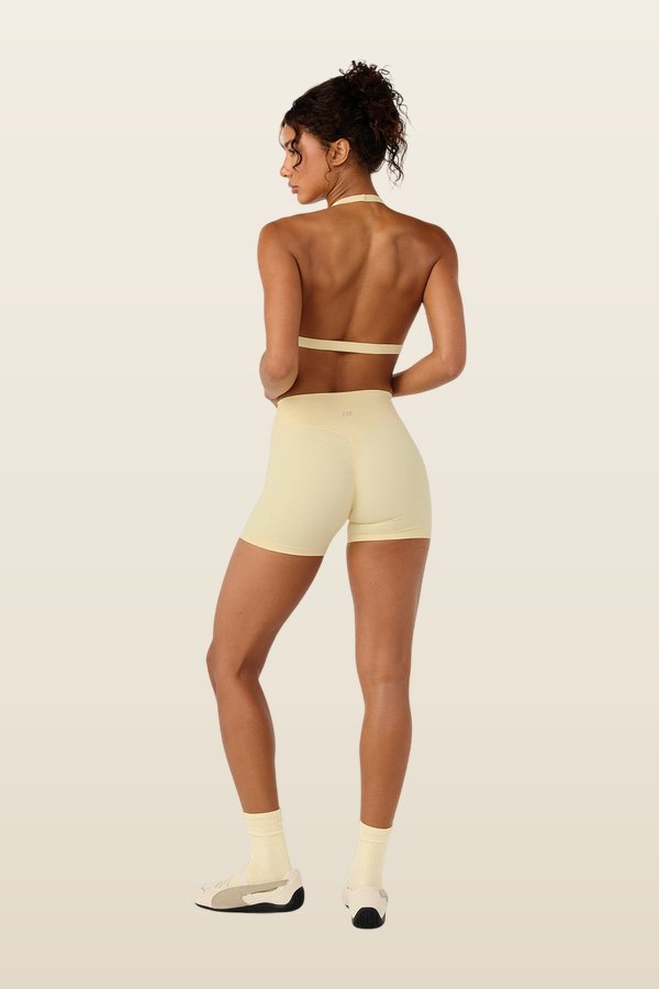 Form Invisible Scrunch Shorts | Butter — model back