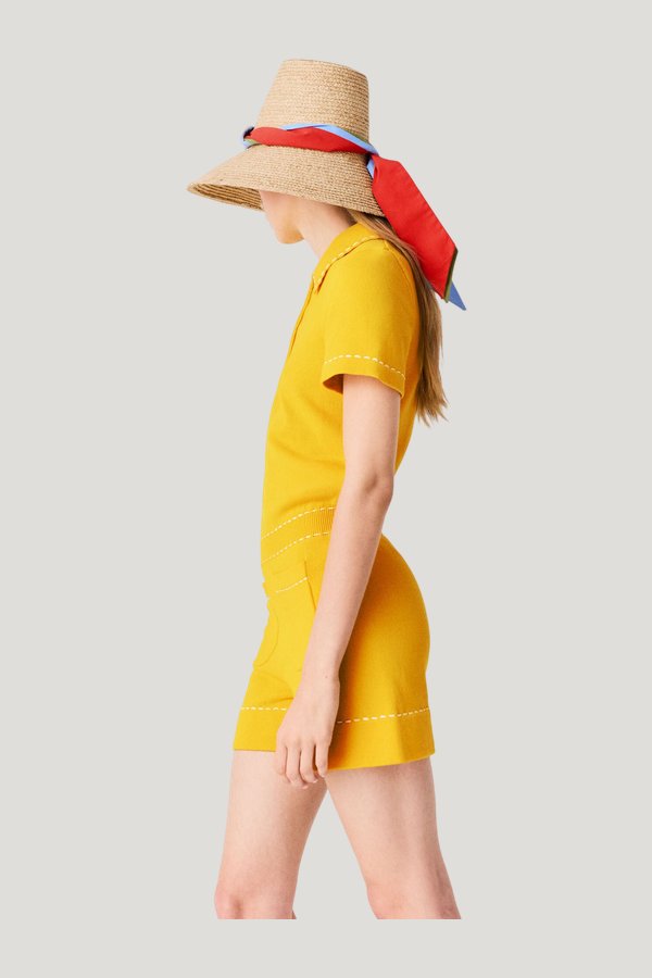 Knit playsuit with polo collar — model side
