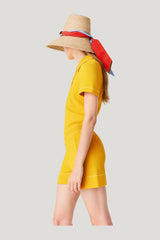 Knit playsuit with polo collar — model side