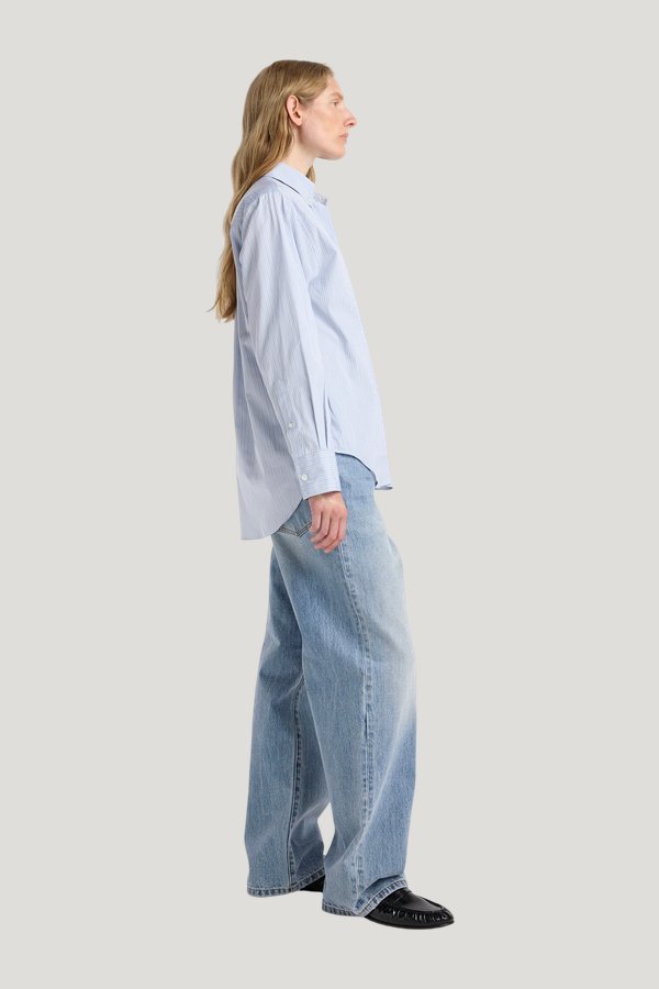 Oxford striped shirt — model side