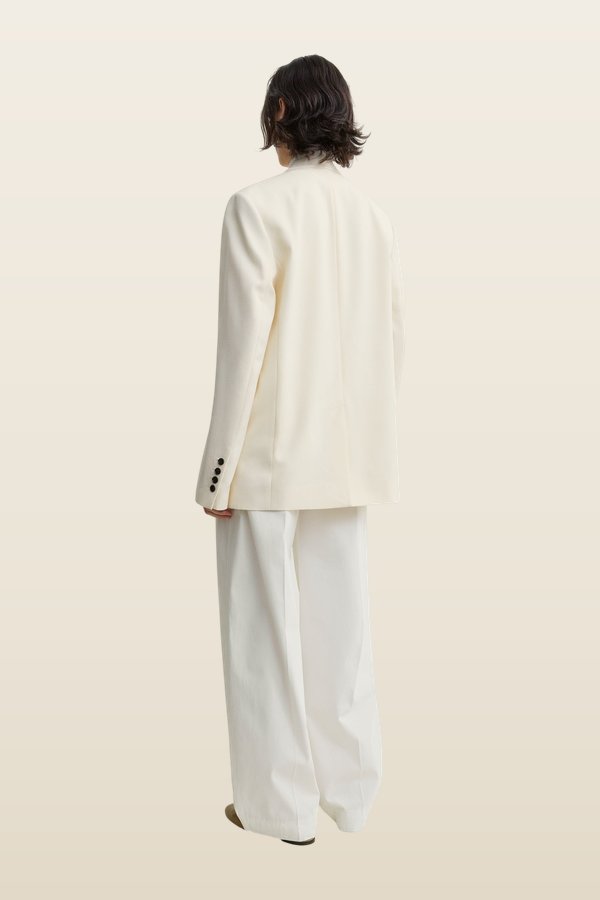 Raw lapel jacket — model back
