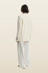 Raw lapel jacket — model back