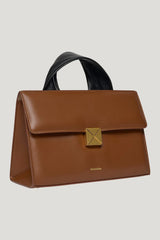 The SANDI Lock - Top handle bag — model front