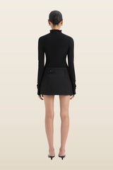 Sandrine Button Mini Skirt — model back