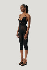 Scarlett Pedal Pusher Jumpsuit Black Zebra Print — model side