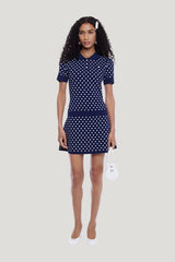 Tumi Sweater Dress In Navy White Polka Dot — model front