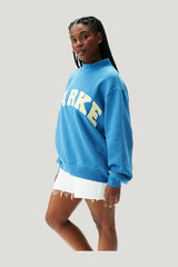Varsity Mockneck - Washed Indigo + Peel — model side